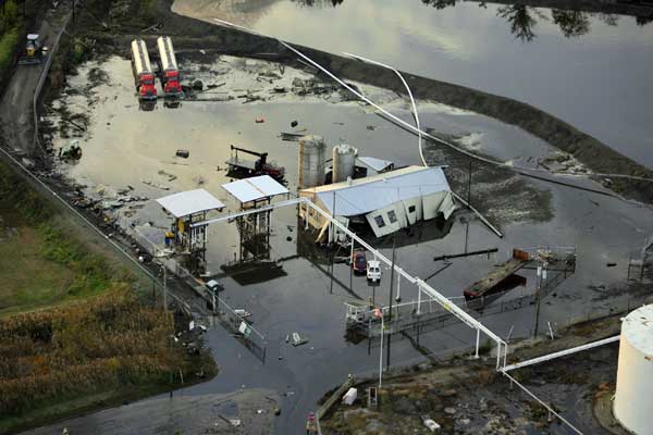 Aerial view showing the overflow from the containment pond after