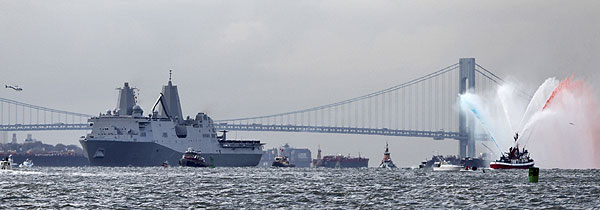 The Navy assault ship New York passes in front of the Verrazano Narrows Bridge as it arrives in New York Harbor, Monday, Nov. 2, 2009. (David Goldman | The Associated Press)
