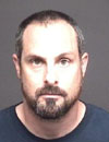 A grand jury indicted Officer Robert Anthony Murray on a charge of embezzlement.