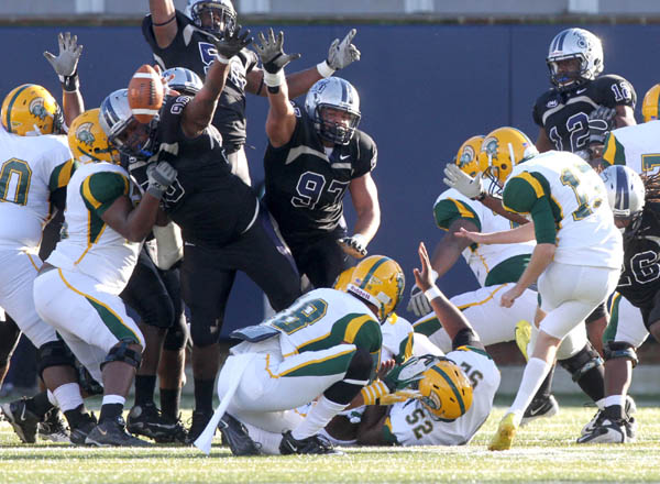 Old Dominion University players block a field goal attempt by Norfolk State University's Ryan Estep on Saturday, Nov. 26, 2011. (Ross Taylor | The Virginian-Pilot)