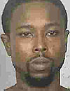 Warrants charge Devon McNair with robbery and using a gun during a felony.