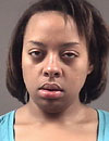 Tena Lin Neese Artise, 22, was charged with burglary, abduction/kidnapping and use of a firearm in the commission of a felony.