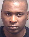 Ellex Sturkey, 35, is charged with two counts of brandishing a firearm.