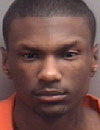 Paris White is charged with armed robbery, burglary, malicious assault and use of a firearm.