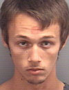 Joshua P. Dalton, 18, is charged with two misdemeanor counts of brandishing a firearm.