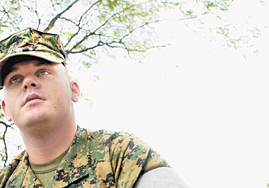 Marine Cpl. Lonnie Young waged the battle of his life in Iraq on April 4:
Trapped on a rooftop with a handful of other men, he helped to face down hundreds of Iraqi insurgents attacking from all directions.
 
 
 
