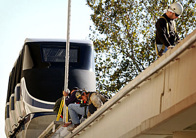 Workers contracted by American Maglev Technology Inc. prepare the guideway for the installation of part of the track at ODU on Wednesday morning. 
 
 
 
 
 
 
